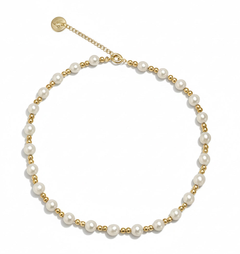 Pearl necklace with gold accents 