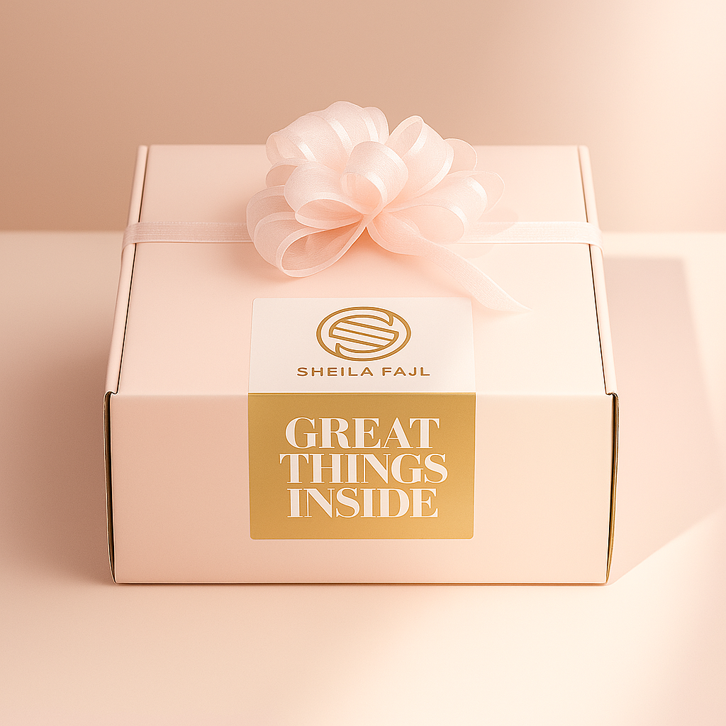 Mystery Gift box with a pink bow and 'Sheila Fajl' branding 